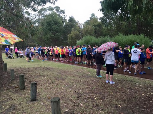 Canning River parkrunners gathered in wet conditions before the Hearts Across Australia departure