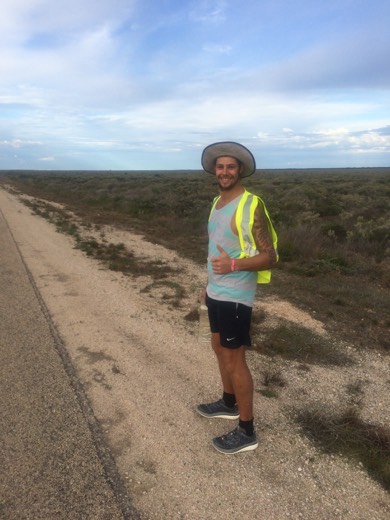 Ols standing on the Eyre Highway verge during his final Hearts Across Australia steps in Western Australia