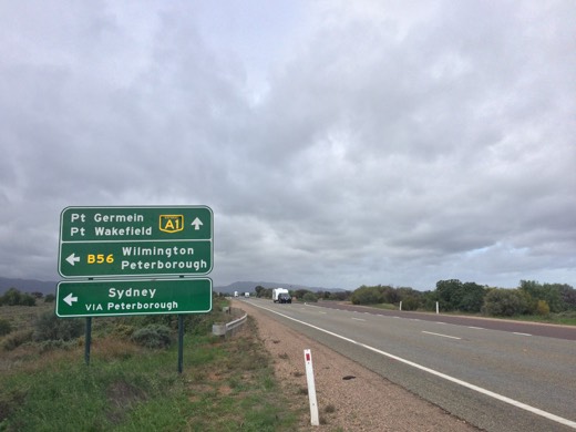 Road sign listing Port Germein, Port Wakefield, Wilmington, Peterborough, and Sydney via Peterborough