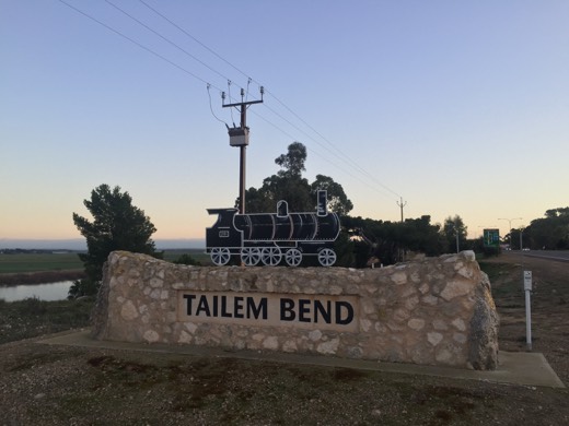 Tailem Bend sign with the Murray River nearby at the start of Day 68