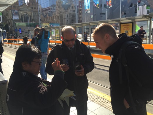 Ben speaking with Melbourne tram ticket inspectors