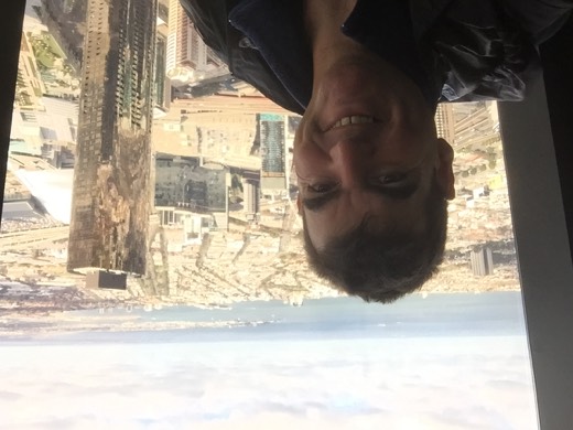 Gary at Eureka Skydeck with Melbourne spread below