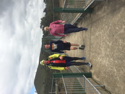Gary walking on a bridge with Brendan Peel from Albert Melbourne parkrun and Allan Connolly from Shepparton parkrun